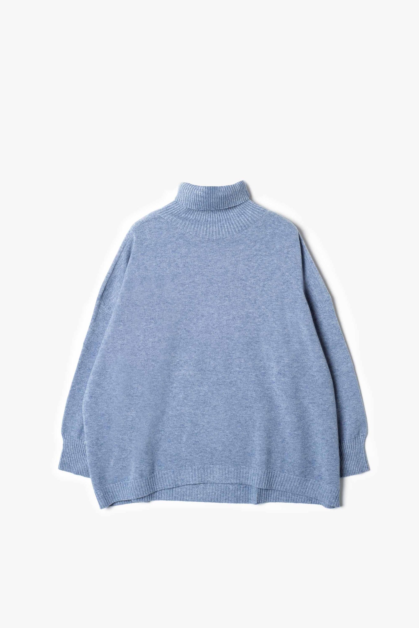 Asymmetric turtleneck sweater.