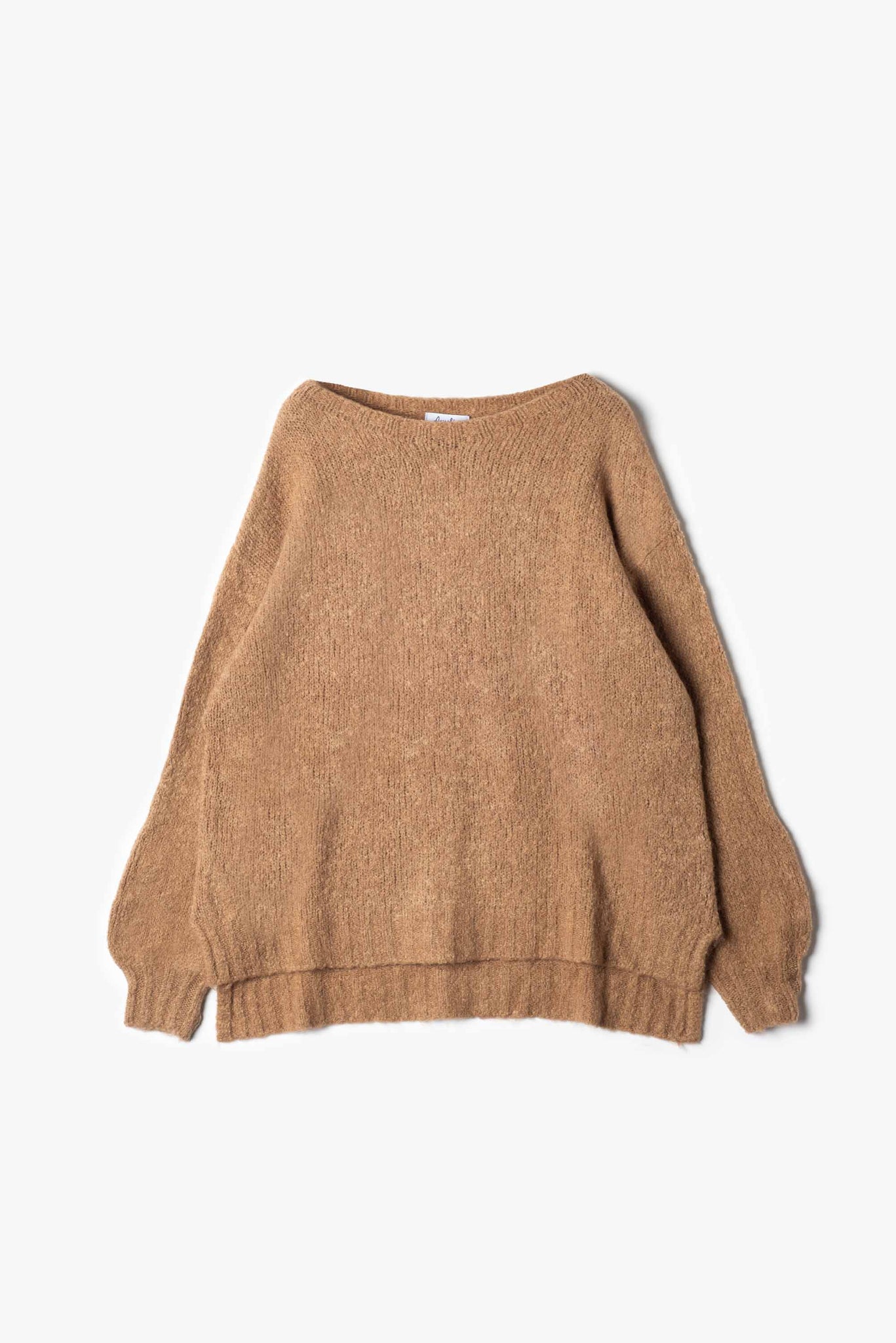 Oversized pullover with side slits.